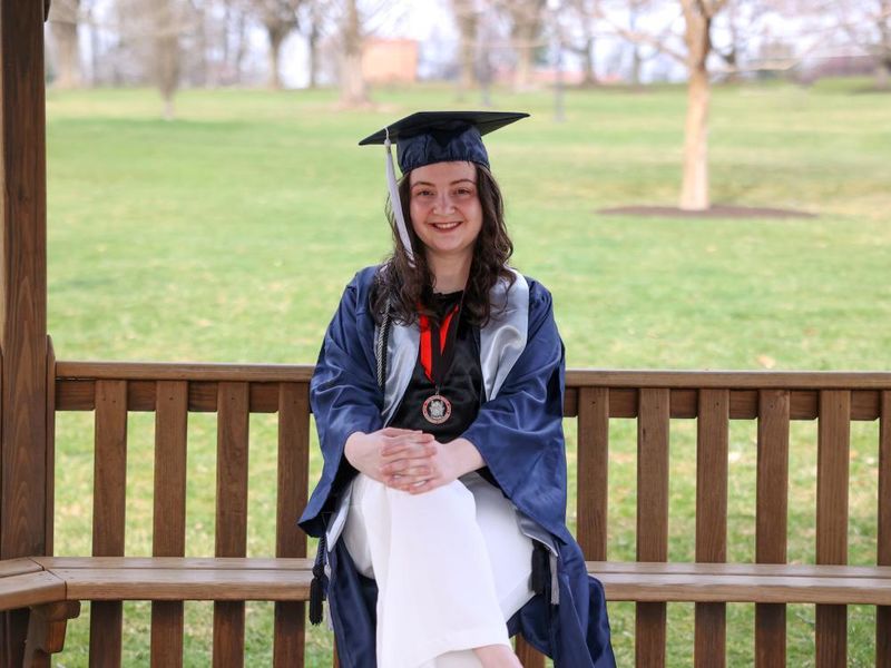 Kaitlyn Pio wearing cap and gown